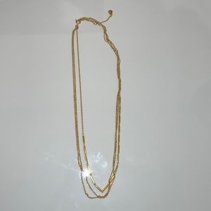Women’s gold triple chain necklace